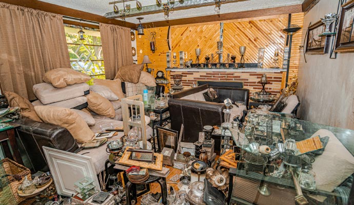A room is crammed full of various objects.
