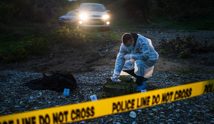 professional person investigating a crime scene