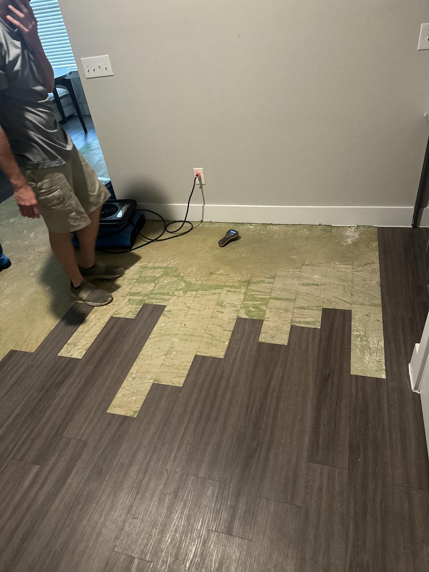 Our water damage restoration team has removed the affected laminate flooring to begin the drying process. This essential step after a fire suppression system leak allows us to address hidden moisture and prevent future mold growth and structural damage.