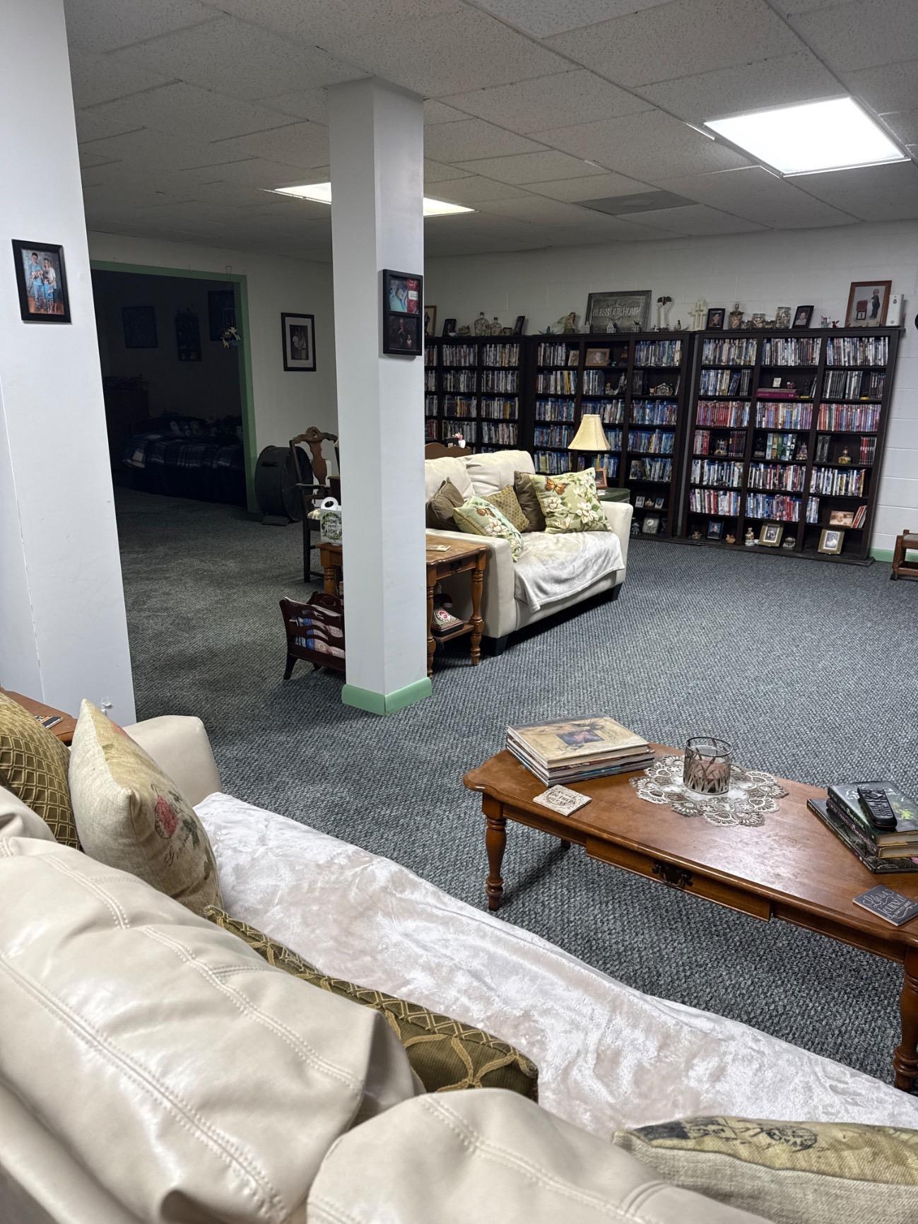 A fully restored basement living space after professional water damage restoration. This 