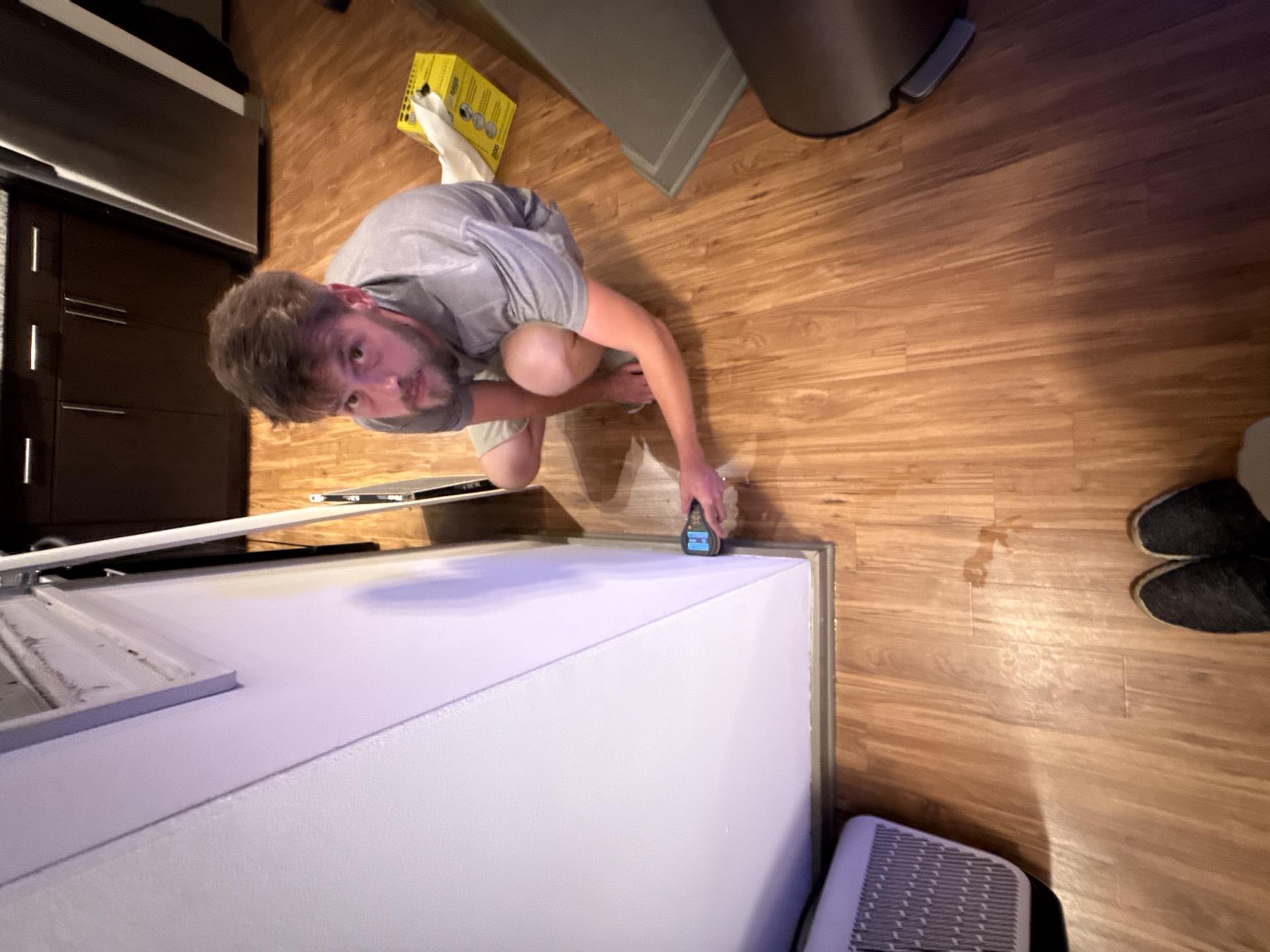Our certified experts meticulously checking for hidden moisture in walls and floors after a water leak, ensuring comprehensive water damage assessment and remediation.