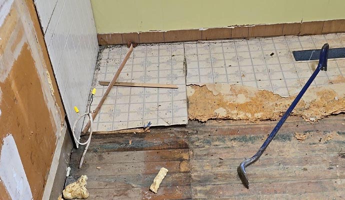 Restoration service for damaged structural floor