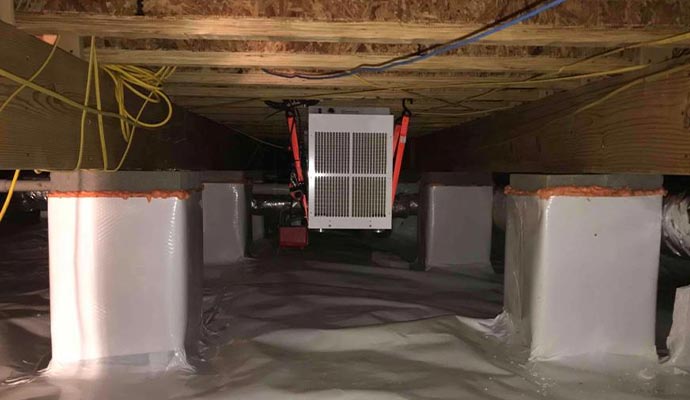 Dehumidifier installed in crawl space