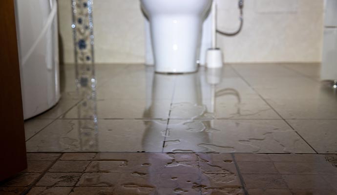 Water damaged bathroom floor