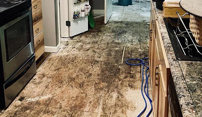 Water damaged kitchen floor