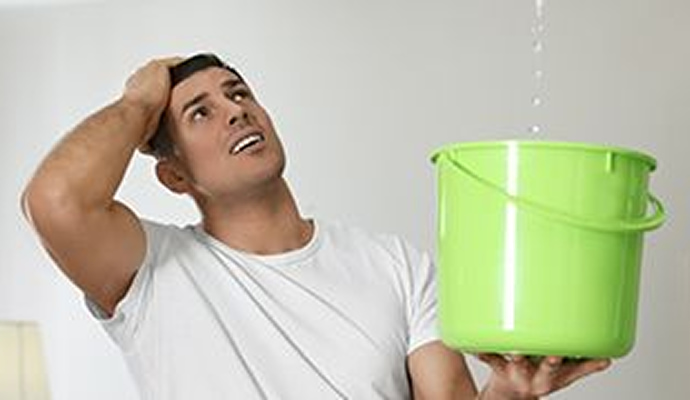 Water leaking from leaked ceiling