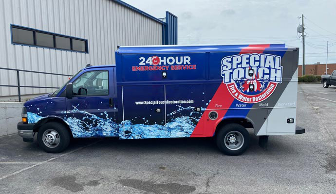 Restoration vehicles or vans of Special Touch Restoration